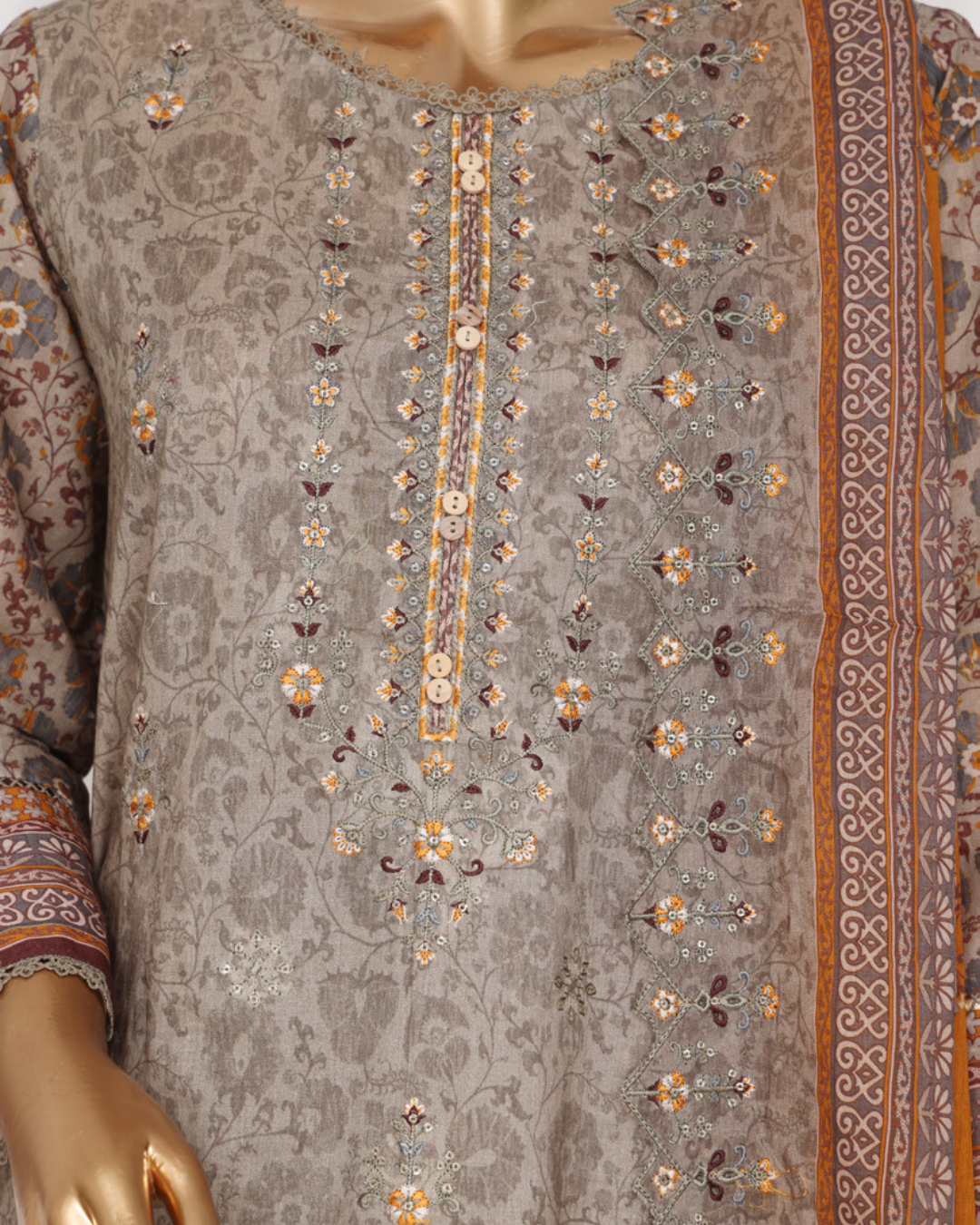 Embroidered garment with floral patterns on a mannequin