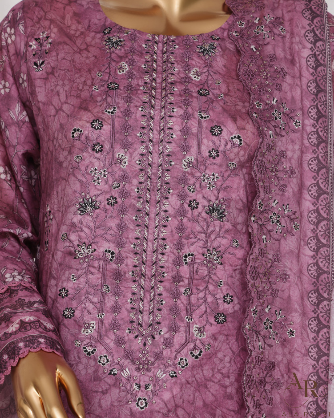 Purple embroidered garment on a mannequin with visible brand logo.