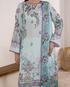 Colorful traditional outfit with floral patterns on a wooden floor