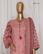 Mannequin wearing a pink floral embroidered outfit with 'RIWAYAT' branding.