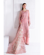 Woman wearing a pink lace outfit against a white background