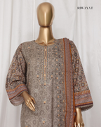 Mannequin wearing a patterned shirt with a matching dupatta against a white background, branded 'RIWAYAT'.