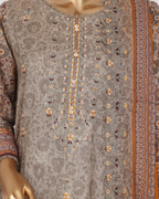 Embroidered garment with floral patterns on a mannequin