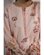 Floral embroidered top with a close-up on the neckline
