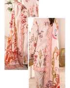 Floral embroidered outfit with a matching shawl on a neutral background