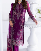 Purple embroidered traditional outfit with a white background