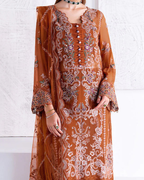 Brown embroidered traditional outfit with a white background