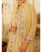 Beige embroidered traditional outfit with matching dupatta against a neutral background