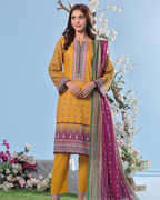 Woman wearing a yellow and pink traditional outfit with floral decorations in the background
